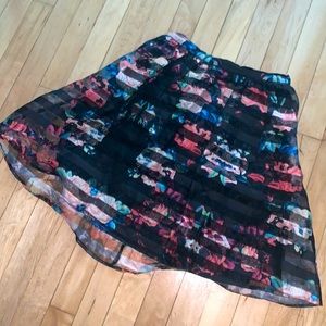 Avant garde floral and black skirt